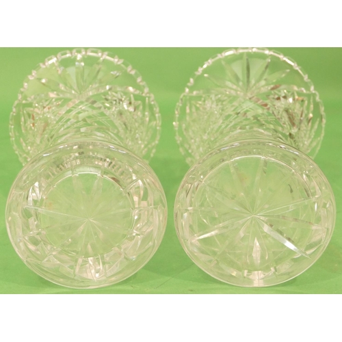 41 - A Pair of Cut Glass Round Bulbous Trumpet Shaped Vases having tooth cut rims, 26cm high (2).