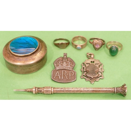 419 - 4 x Silver Rings, a silver propelling pencil, a silver badge, another badge and a plated and enamell... 