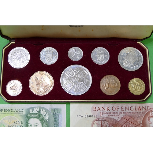 428 - A 1953 Royal Mint Coronation Proof Set comprising 10 coins, cased, a 10 shilling note and a pound no... 