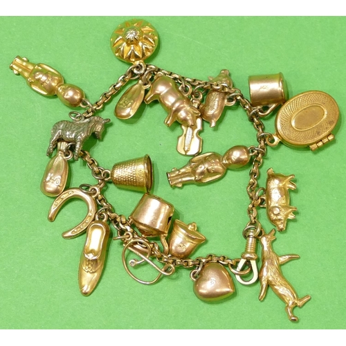 435 - A Gold Plated Bracelet mounted with 16 gold charms and 5 plated charms, overall weight 23.4g gross.