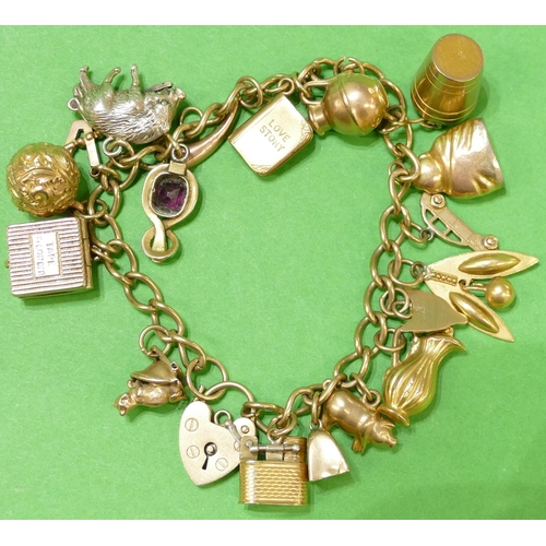 437 - A 9ct Gold Charm Bracelet having padlock clasp mounted with 15 gold charms and 1 silver charm, overa... 