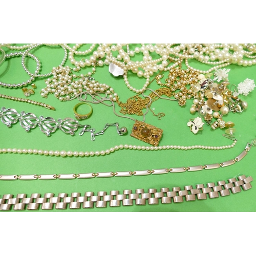 440 - A Silver Coloured Metal Chain, another linked chain, a cultured pearl graduated necklace having silv... 