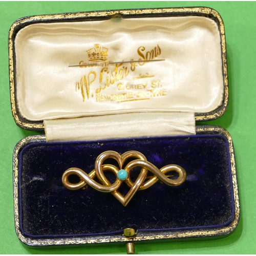 451 - A Victorian 9ct Gold Heart Shaped and Entwined Brooch having centre turquoise, 4.2cm wide, 2.9g gros... 