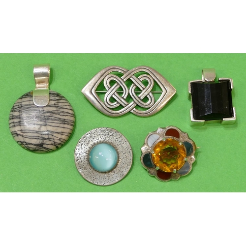 454 - A Silver Scottish Small Brooch set with centre yellow stone surrounded by coloured hard stones, 2.5c... 