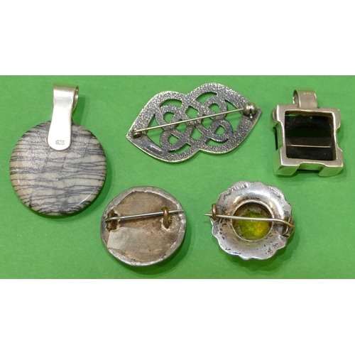 454 - A Silver Scottish Small Brooch set with centre yellow stone surrounded by coloured hard stones, 2.5c... 