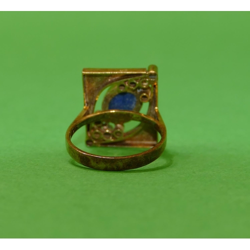 522 - A 14ct Gold Rectangular Pierced Ring set with oval lapis lazuli, flanked by 2 small diamonds, size P... 