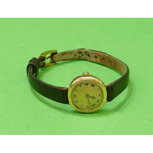 528 - A Morris 9ct Gold Circular Wristwatch, having Roman numerals, leather strap bracelet.