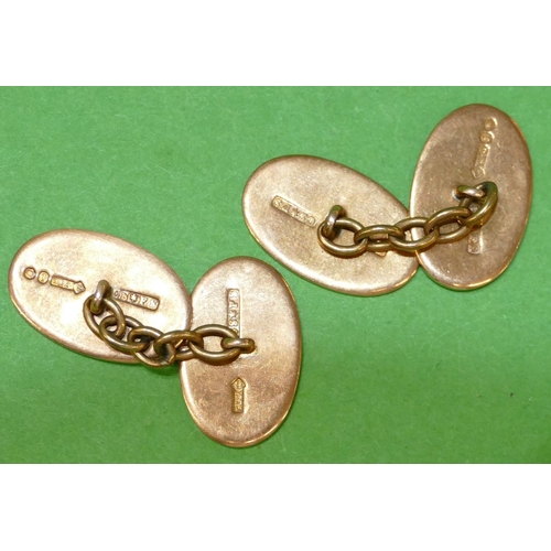 541 - A Pair of Oval Gentleman's 9ct Gold Cufflinks having engine turned decoration, 7.5g.