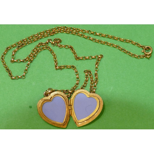 552 - A 9ct Gold Heart Shaped Locket having engraved floral decoration, with chain, 10.4g.