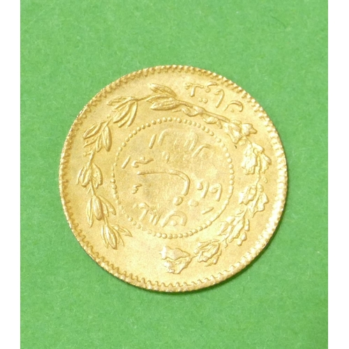 557 - An Arabic Gold Coin, 2.4g.