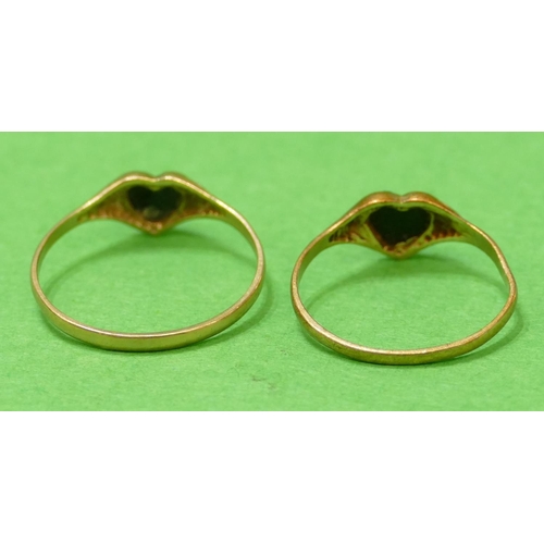 561 - 2 x 9ct Gold Rings having heart shaped motifs inset with black stones, size O/R and K/L, 1.6g gross.