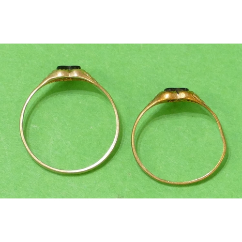 561 - 2 x 9ct Gold Rings having heart shaped motifs inset with black stones, size O/R and K/L, 1.6g gross.