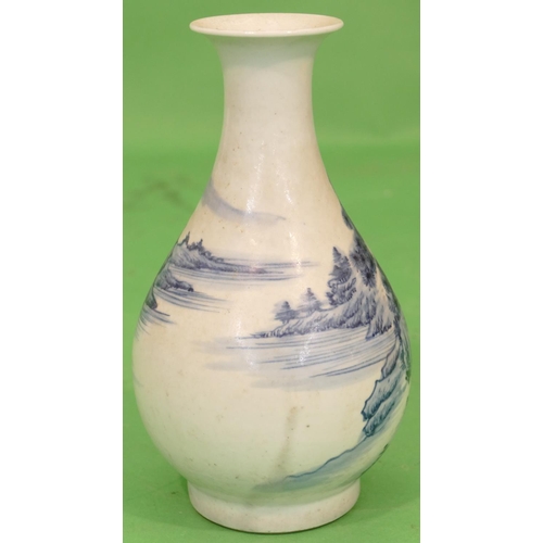 57 - An Oriental Round Bulbous Thin Necked Trumpet Shaped Vase on blue and white ground having river land... 