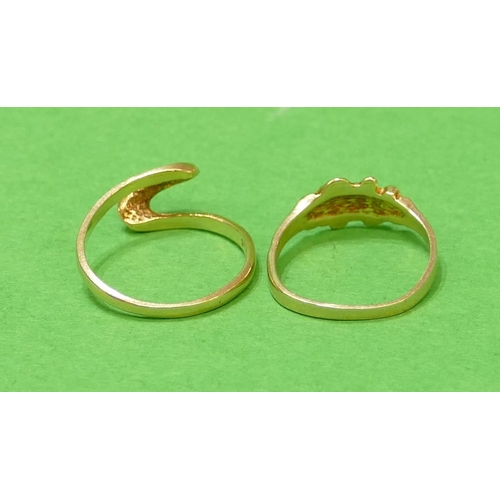 579 - An 18ct Gold Twist Ring having blue enamelled decoration, size K, also a 14ct gold ring, size K, 3.5... 