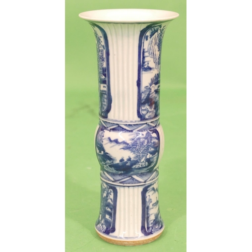 58 - An Oriental Round Bulbous Trumpet Shaped Vase on blue and white ground having panels of river landsc... 