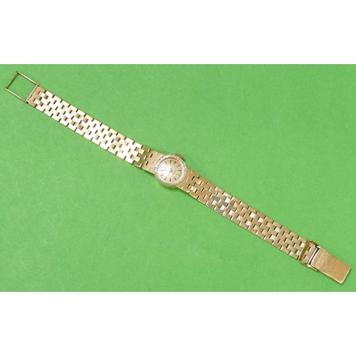 585 - A 9ct Gold Ladies Circular Rotary Wristwatch having matching gate bracelet, weighable gold 20.2g gro... 