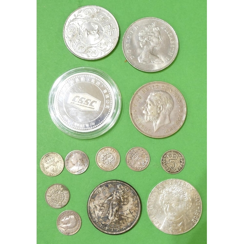 613 - A 1935 Silver Crown, a 1909 1 peso, a silver Oriental crown boxed and a small quantity of various ot... 