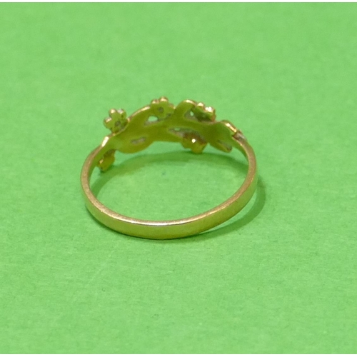 642 - A 9ct Gold Ladies Ring in form of flower buds inset with small diamond chips, size N, 1.5g gross.