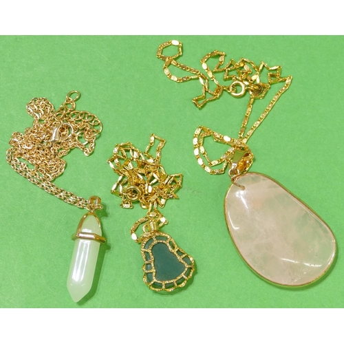 669 - A Hardstone Drop Pendant with chain, a jade style pendant with chain and another jade style pendant ... 