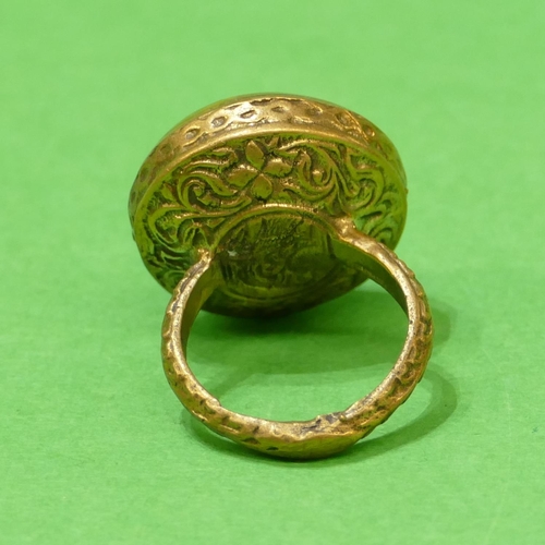 674 - A Roman Style Gilt Circular Ring having horse motif, size Q.