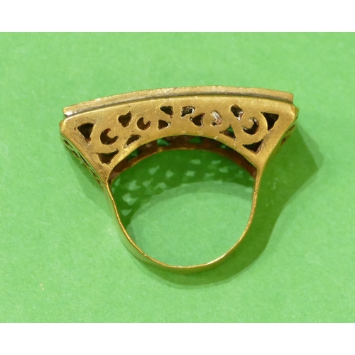 675 - A Roman Style Large Gilt Ring having pierced decoration, size R/S.