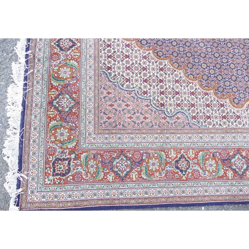 713 - A Persian Style Rug on blue and cream ground having centre medallion, 2m 97cm x 2m.