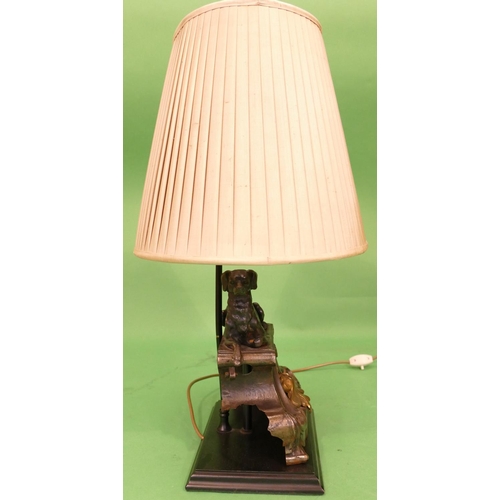 715 - A Good Quality Spelter Table Lamp in form of a relaxing dog on scallop shaped platform with shade an... 