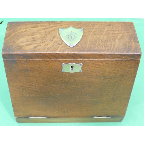 727 - A Victorian Oak Stationery Box having hinge lid and full front, stamped Steele & Co with red leather... 