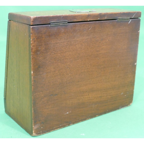 727 - A Victorian Oak Stationery Box having hinge lid and full front, stamped Steele & Co with red leather... 