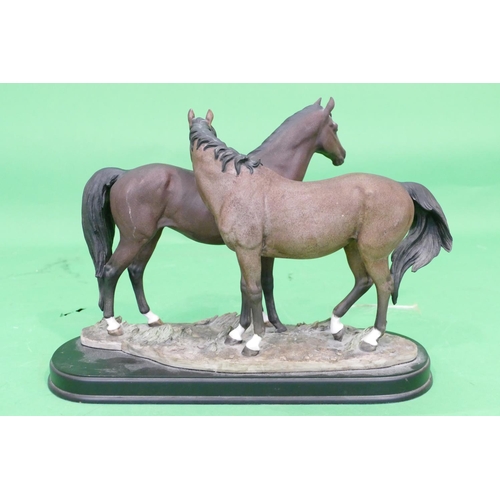 740 - A Modern Plaster Group of 2 Horses, on oblong base, 39cm wide, 28.5cm high.