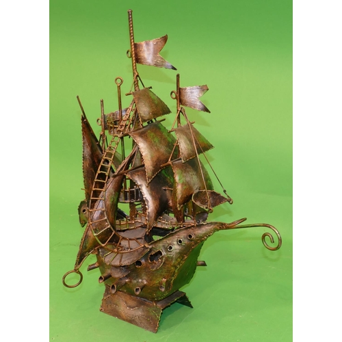 756 - An Arts and Crafts Style Metal Model of a galleon, 59cm high.