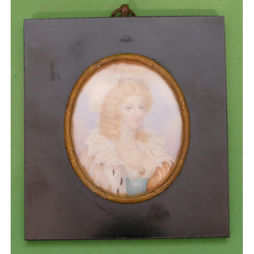 802 - An Oval Miniature shoulder length portrait of a young lady in ebonised frame, 6cm x 7cm.