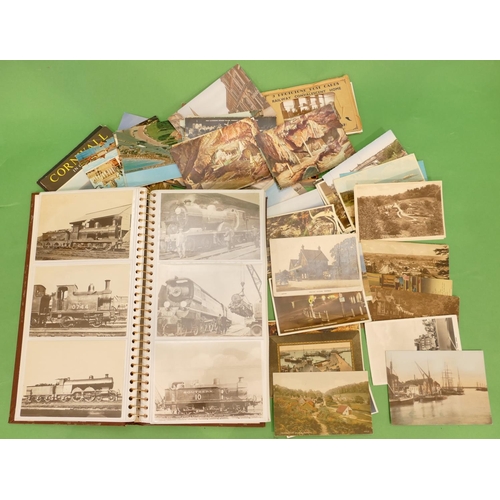 807 - An Album of Cigarette Cards depicting trains etc and a quantity of various loose postcards.