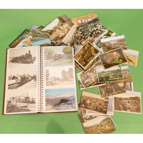 807 - An Album of Cigarette Cards depicting trains etc and a quantity of various loose postcards.