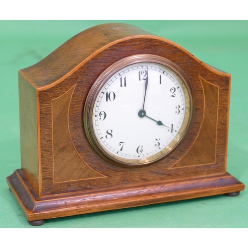 819 - An Edwardian Mahogany Arched Top Timepiece having inlaid stringing, white enamel dial with Arabic nu... 