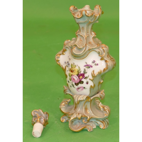 86 - A Paris Porcelain Bulbous Scallop Shaped Scent Bottle with stopper having multicoloured floral, leaf... 