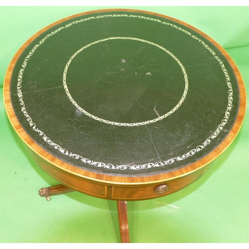 868 - A Mahogany Round Drum Occasional Table having revolving top with black leather inset, inlaid stringi... 