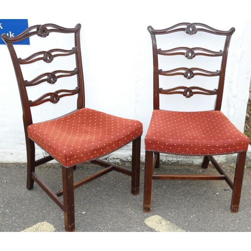 869 - A Set of Eighteen Good Quality Reproduction Mahogany Pierced Wavy Ladder Back Dining Chairs, having ... 