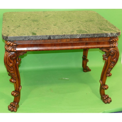 876 - A 19th Century Carved Walnut Centre Table having green marble top, on 4 cabriole legs with raised ca... 