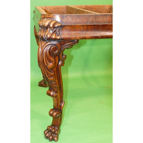 876 - A 19th Century Carved Walnut Centre Table having green marble top, on 4 cabriole legs with raised ca... 