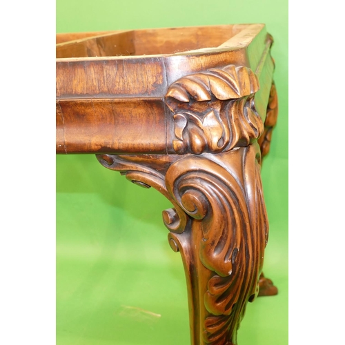 876 - A 19th Century Carved Walnut Centre Table having green marble top, on 4 cabriole legs with raised ca... 