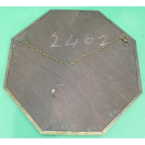 879 - An Octagonal Brass Hanging Bevelled Wall Mirror with embossed floral and leaf decoration, 47.5cm wid... 