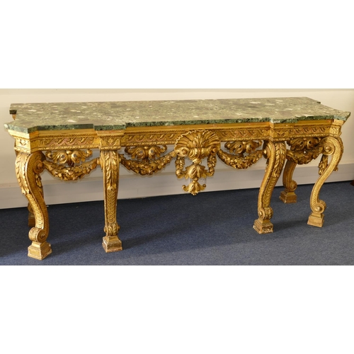 881 - An 18th Century & Later Carved Gilt Wood Console Table having green speckled marble top, carved frie... 