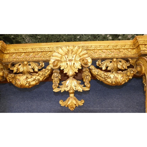 881 - An 18th Century & Later Carved Gilt Wood Console Table having green speckled marble top, carved frie... 