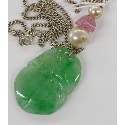 443 - A Jade Drop Pendant having carved leaf decoration mounted on silver chain.