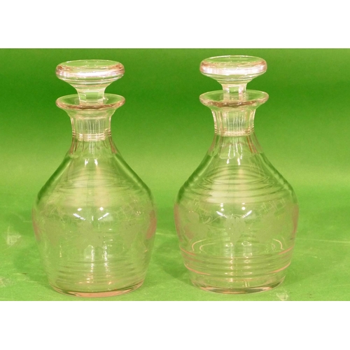 111 - A Pair of Georgian Round Bulbous Thin Necked Decanters having mushroom shaped stoppers, having etche... 