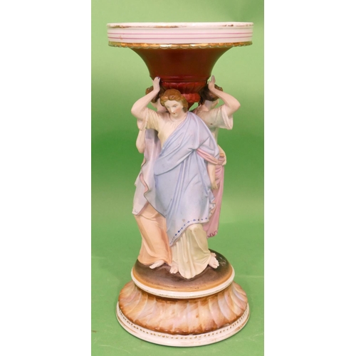 41 - A China Stand in form of 3 graces, on round sweeping base, 30.5cm high (missing bowl to top).