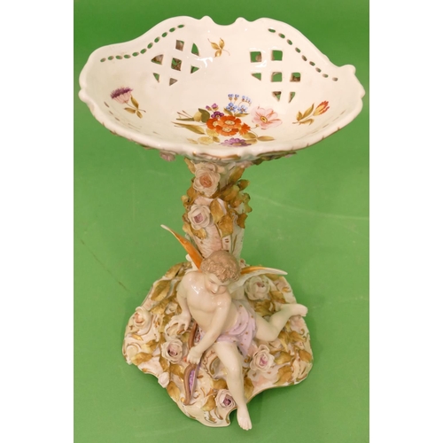 43 - A Continental China Oval Comport having raised cupid motif with all over encrusted floral and leaf d... 