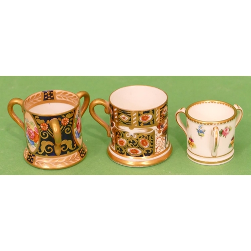 75 - A Minton's Miniature 3 Handled Loving Cup on white ground with multicoloured floral, lea and gilt de... 