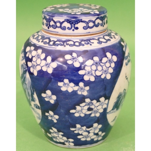 82 - An Oriental Round Bulbous Lidded Ginger Jar on blue and white ground depicting figure and blossom de... 